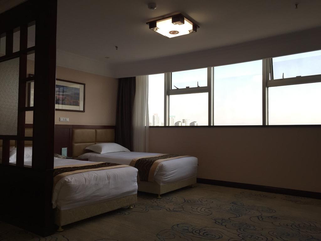 Qingdao Hotel Rum bild