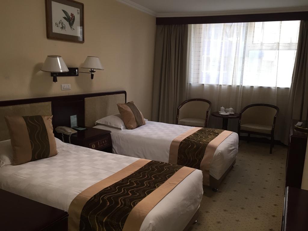Qingdao Hotel Rum bild